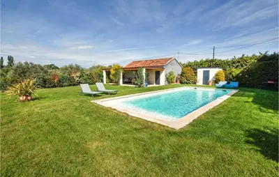 a swimming pool in the yard of a house at Stunning Home In Pernes-Les-Fontaines in Pernes-les-Fontaines