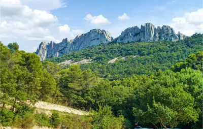 a view of a mountain with trees and rocks at Stunning Home In Pernes-Les-Fontaines in Pernes-les-Fontaines