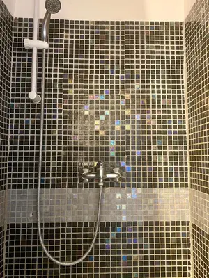 a bathroom with a shower with a sink at Bergerie Joy, bienvenue entre Ciel & Terre in Saint-Christol
