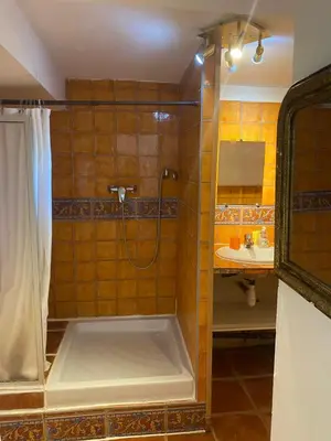 a bathroom with a shower and a sink at Bergerie Joy, bienvenue entre Ciel & Terre in Saint-Christol