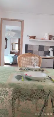 a table with a plate on it in a room at la maison de josy in Aix-en-Provence