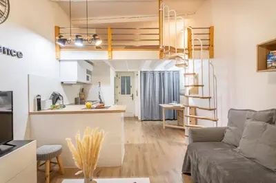 a small apartment with a kitchen and a living room at Studio Cardeurs in Aix-en-Provence