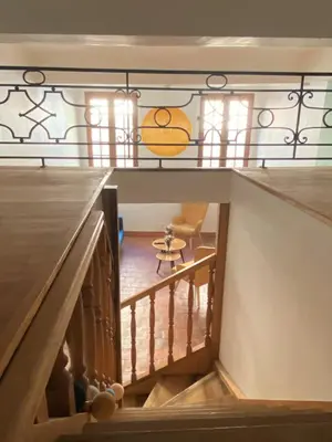 a view from the top floor of a house with a staircase at Studio Mezzanine Mairie in Aix-en-Provence