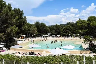 a group of people in a swimming pool at Résidence Hôtel du Golf de Pont Royal - maeva Home - Appartement 2 pièces 4 personnes climatisé - Sélection MAE-2504 in Mallemort