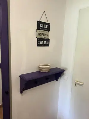 a door with a blue shelf with a sign on it at Résidence Hôtel du Golf de Pont Royal - maeva Home - Appartement 2 pièces 4 personnes climatisé - Sélection MAE-2504 in Mallemort
