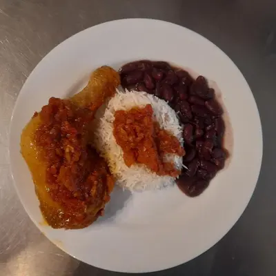 a plate of food with rice and beans at Chambre basilic 2p, 2 nuits max, dans petit chalet 6km du festival de piano de la roque d'anthéron in Rognes
