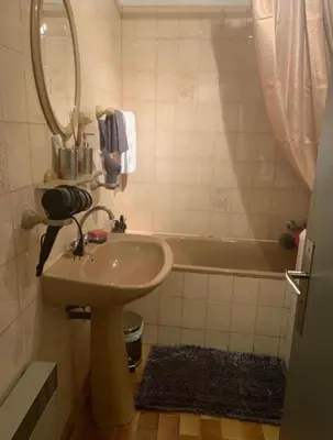 a bathroom with a sink and a bath tub at Studio de Luxe Aix en Provence in Aix-en-Provence