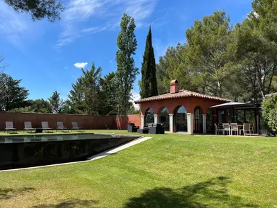 a house with a pool in a yard at Petite Toscane Villa close to Aix en Provence in Ventabren