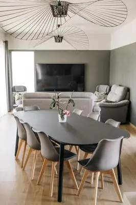 a dining room with a table and chairs at Villa Moka - private pool in Saumane-de-Vaucluse