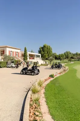 a group of motorcycles parked on a golf course at Village Pont Royal en Provence - maeva Home - Appartement climatisé 3 pièces 4 personnes - Prestige - super Home MAE-7124 in Mallemort
