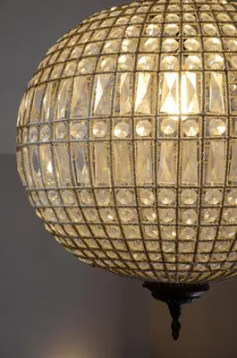 a glass ball chandelier hanging from a ceiling at Demeures et Châteaux Hôtel L'Hermitage in Pernes-les-Fontaines