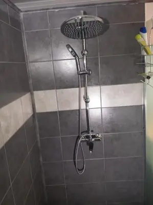 a shower with a shower head in a bathroom at Location provence ventoux sault in Sault-de-Vaucluse
