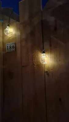 a room with two lights on the wall at La calade in Vedène