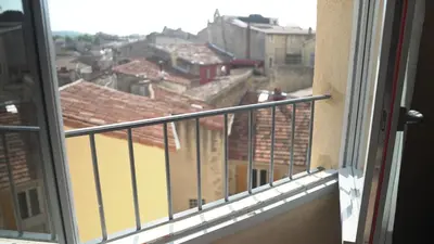 a view of a city from a balcony at La Maison des Lamanon in Salon-de-Provence