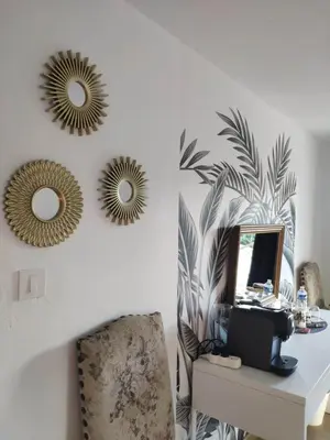 a room with a desk and two mirrors on the wall at La Tourelle Suite Cosy entre vignoble aixois et Luberon in Le Puy-Sainte-Réparade