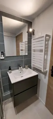 a bathroom with a sink and a mirror at MyLuberon-Appartement au pied du Luberon in Lauris