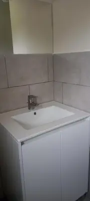 a white sink with a faucet on top of it at Campagne Carbonel in Aix-en-Provence