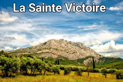 a mountain in the distance with the words la santa vitiae at Campagne Carbonel in Aix-en-Provence