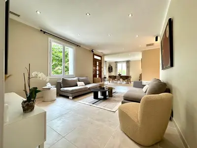 a living room with a couch and a chair at Villa Saint Jean En Provence in Châteaurenard