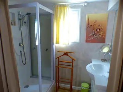 a bathroom with a shower and a sink at TOSCANE in Saint-Rémy-de-Provence