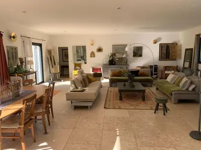 a large living room with couches and a table at Contemporary house 5mn away from Aix in the countryside in Aix-en-Provence