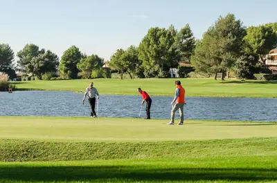 a group of people playing golf on a golf course at Village Pont Royal en Provence - maeva Home - Appartement 2 pièces 5 personnes Sélection MAE-2264 in Mallemort