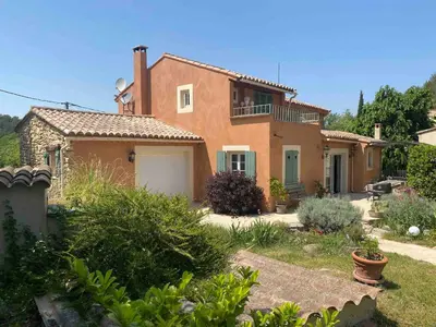 a house with a garden in front of it at Mas de Peyre in Le Beaucet