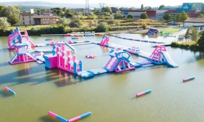 a group of inflatable rides in the water at BOHO 2 Vue Panoramique in Bonnieux
