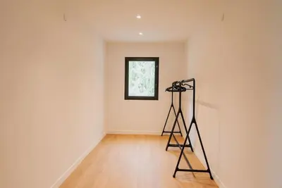 a room with a tripod in a room with a window at Maison en Provence avec piscine in Éguilles