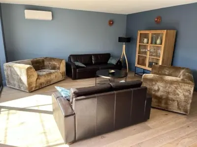 a living room with a couch and two chairs at Villa de charme in Châteauneuf-de-Gadagne