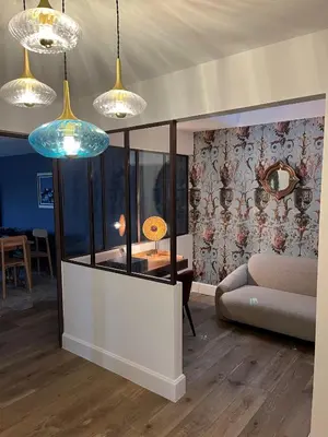 a living room with a couch and a table at Villa de charme in Châteauneuf-de-Gadagne