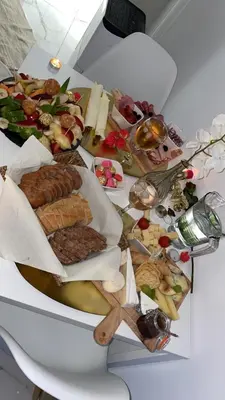 a table topped with lots of different types of food at Spa NESSA in Saint-Andiol