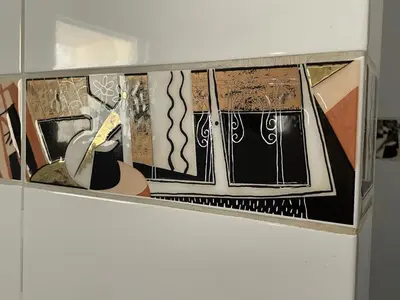 a box filled with different types of art on a wall at Appartement centre Apt Bèlavista luberon in Apt