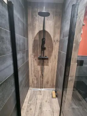 a shower in a bathroom with a glass door at Ma Charmante Maison En Provence in Lançon-Provence