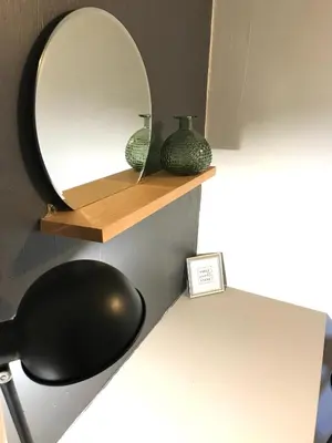 a mirror on a shelf with two vases on it at Superbe bas de villaIX - Maison Odonata in Aix-en-Provence