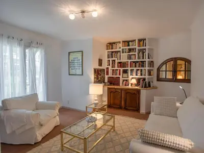 a living room with a couch and a table at Le grand Liodrey in Céreste