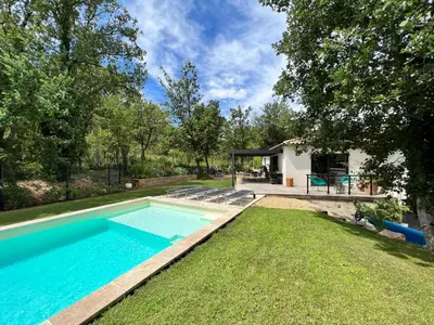 a swimming pool in the backyard of a house at Luxury Villa with Pool en Provence in Le Puy-Sainte-Réparade