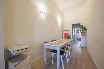 a dining room with a table and chairs at Le Cocon Aixois in Aix-en-Provence
