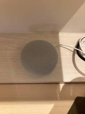a microphone sitting on top of a wooden table at Le Fernandol by La Familia in Aix-en-Provence