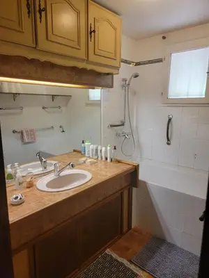 a bathroom with a sink and a tub at Maison T4, campagne Provençale calme, tout confort in Lambesc