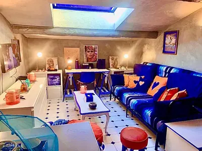a living room with a couch and a table at Appartement de Luxe ,