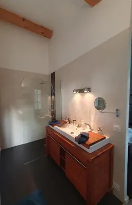 a bathroom with a sink and a shower at Lou Pantai, Bed and Breakfast, Delux Bedroom with AC in Aix-en-Provence