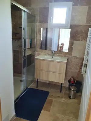 a bathroom with a sink and a shower at Petite maison en campagne in Pernes-les-Fontaines