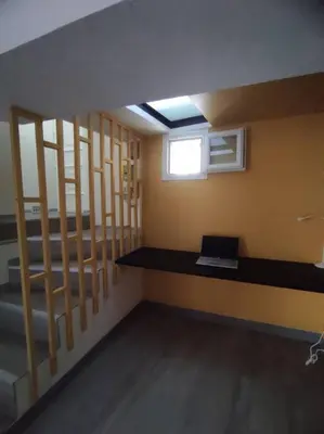 a room with bunk beds and a laptop on a table at Maison de village avec exterieur in Lambesc
