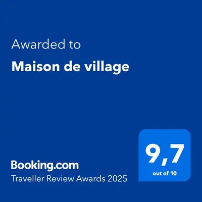 a blue screen with the text awarded to mission de village at Maison de village in Pernes-les-Fontaines