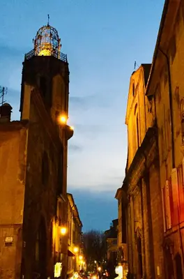 a building with a clock tower on top of it at Tiny Harmony - Logement confortable avec jardin et jacuzzi privés près d’Aix en Provence in Venelles