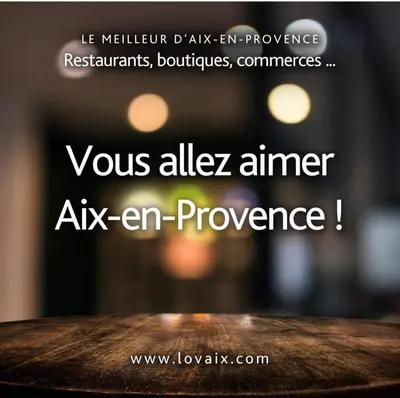 a close up of a wooden table with the words aux alleleziner aken at Villa ELISABETH in Aix-en-Provence