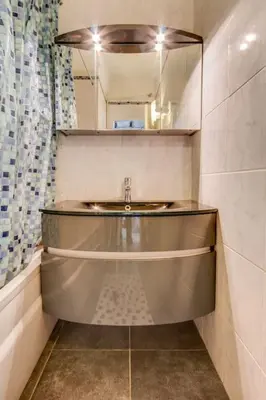 a bathroom with a sink and a mirror at Le Blondel in Aix-en-Provence