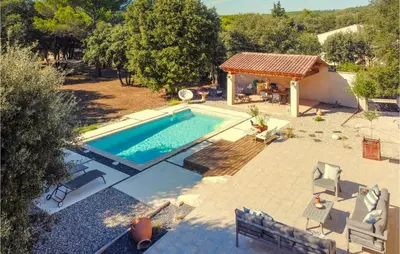 an overhead view of a swimming pool in a backyard at Nice Home In Pernes-Les-Fontaines in Pernes-les-Fontaines