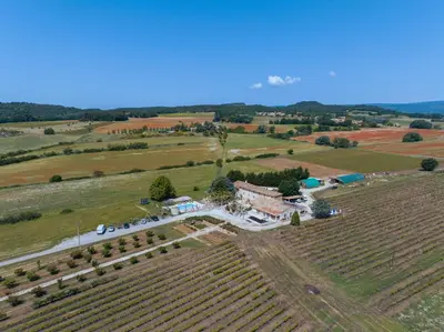 an aerial view of a farm and a field at Le Moulin de Lavon in Gargas